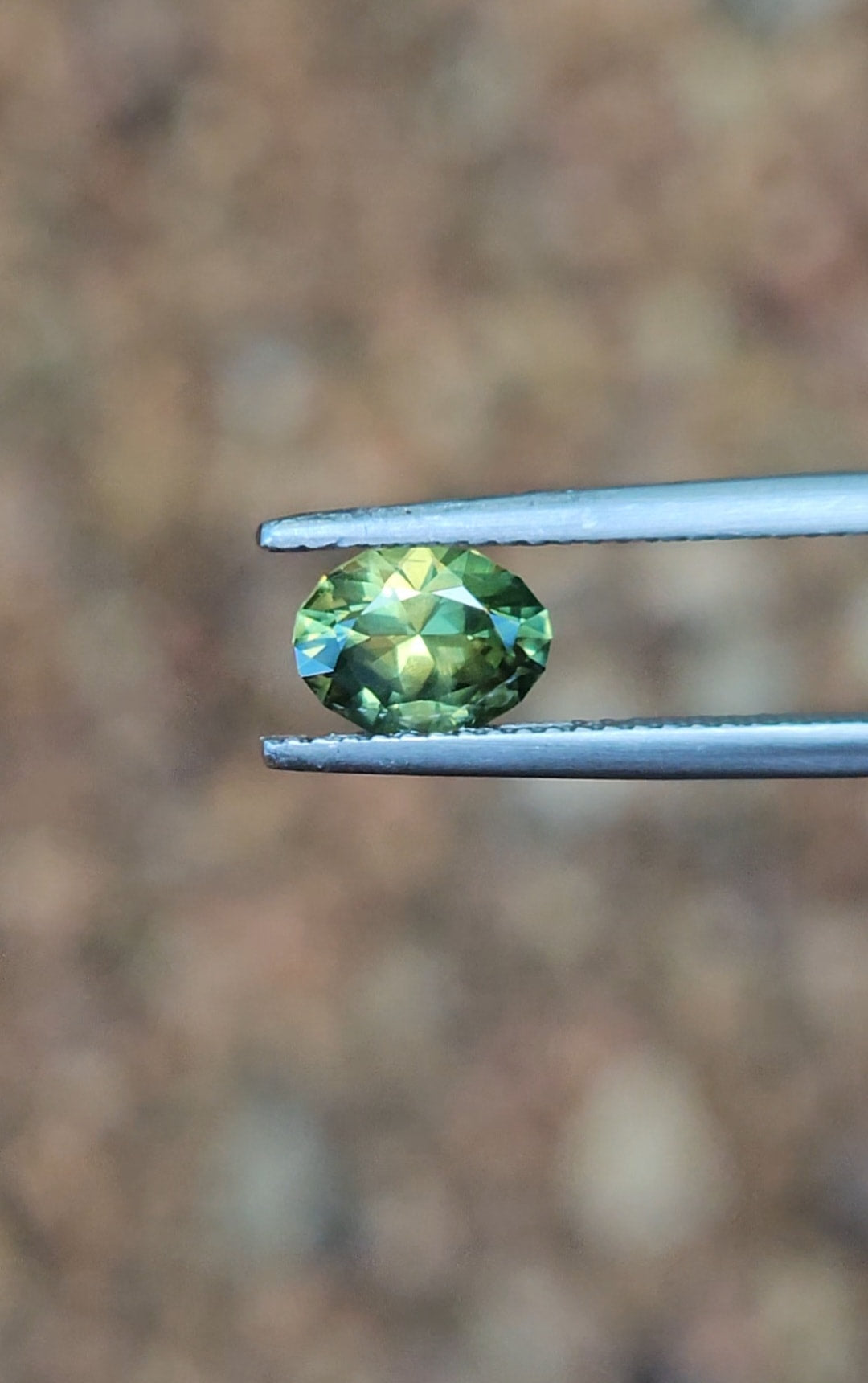 1.36ct Oval Green Parti Sapphire