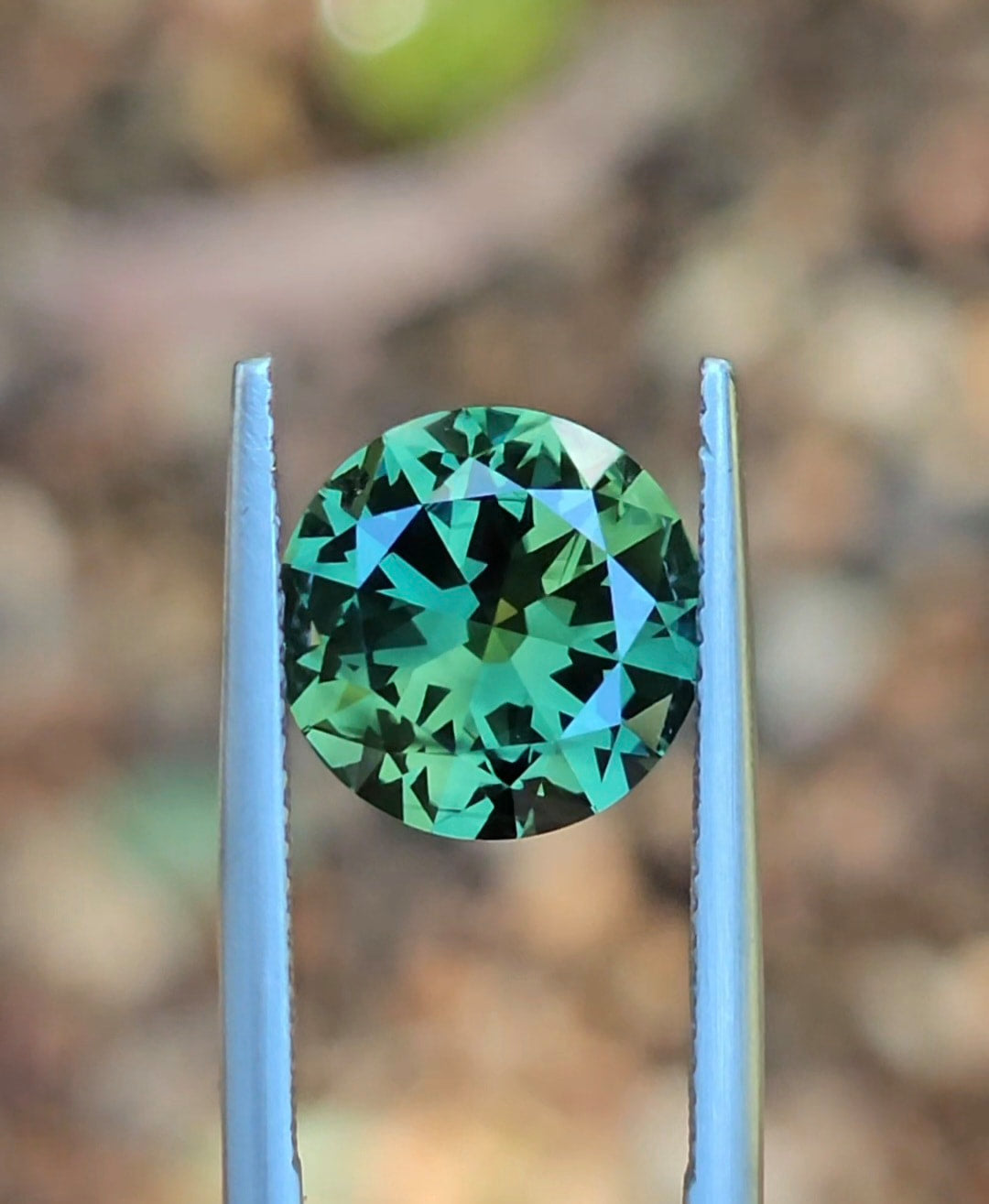 4.73ct Round Green Parti Sapphire