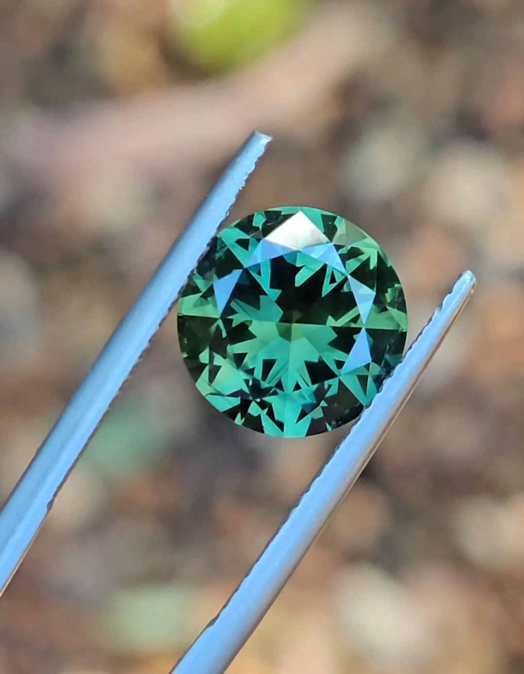 4.73ct Round Green Parti Sapphire