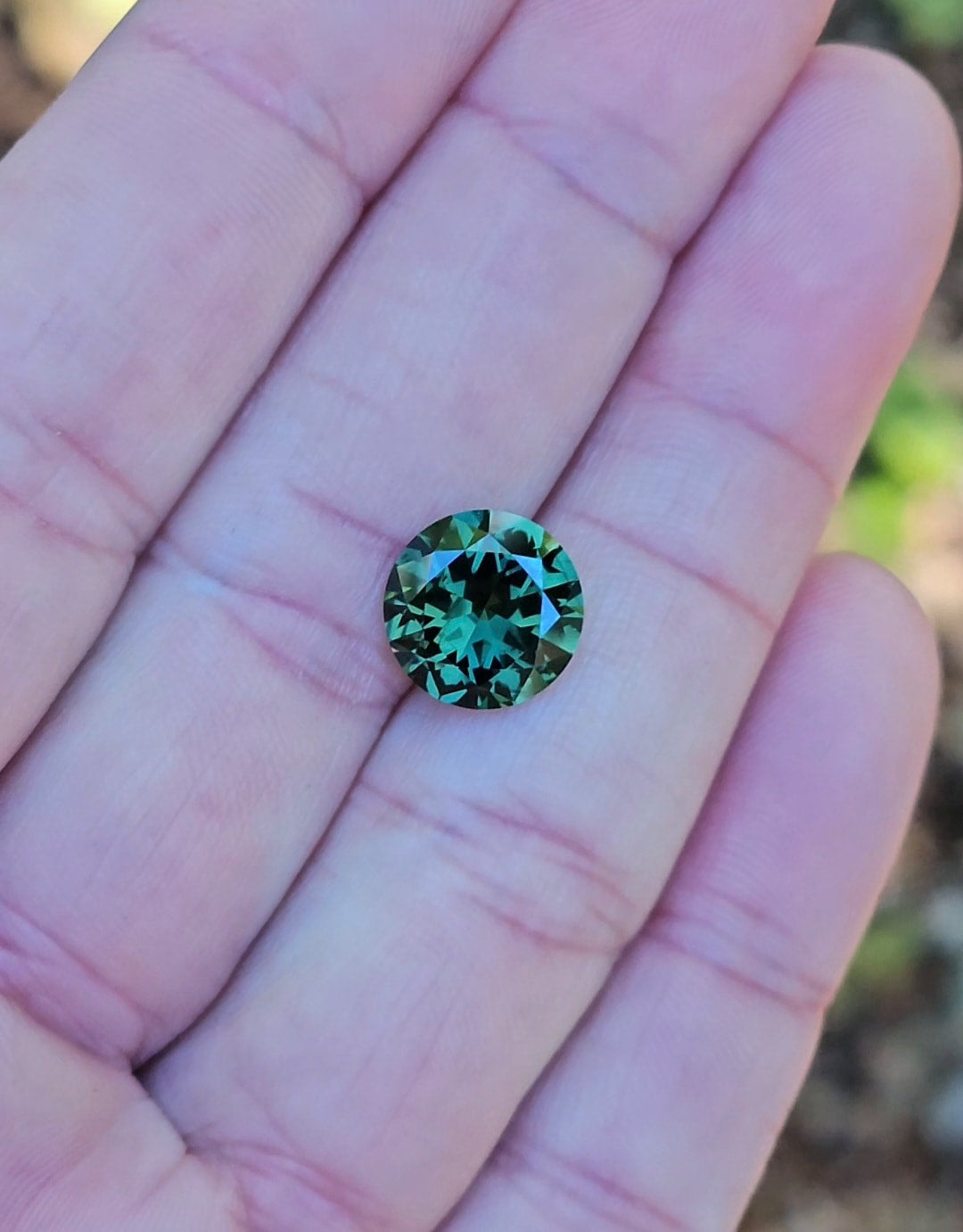 4.73ct Round Green Parti Sapphire