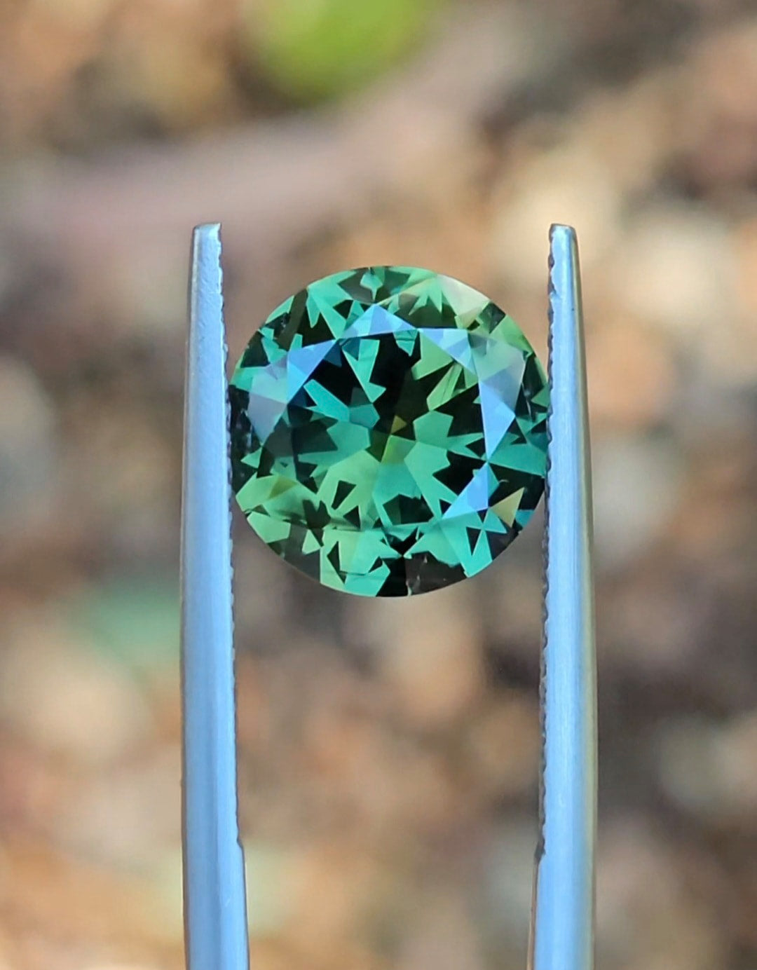 4.73ct Round Green Parti Sapphire