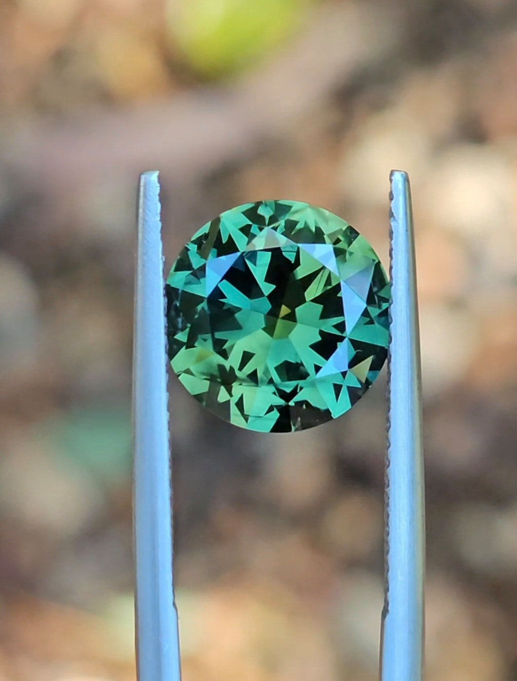 4.73ct Round Green Parti Sapphire