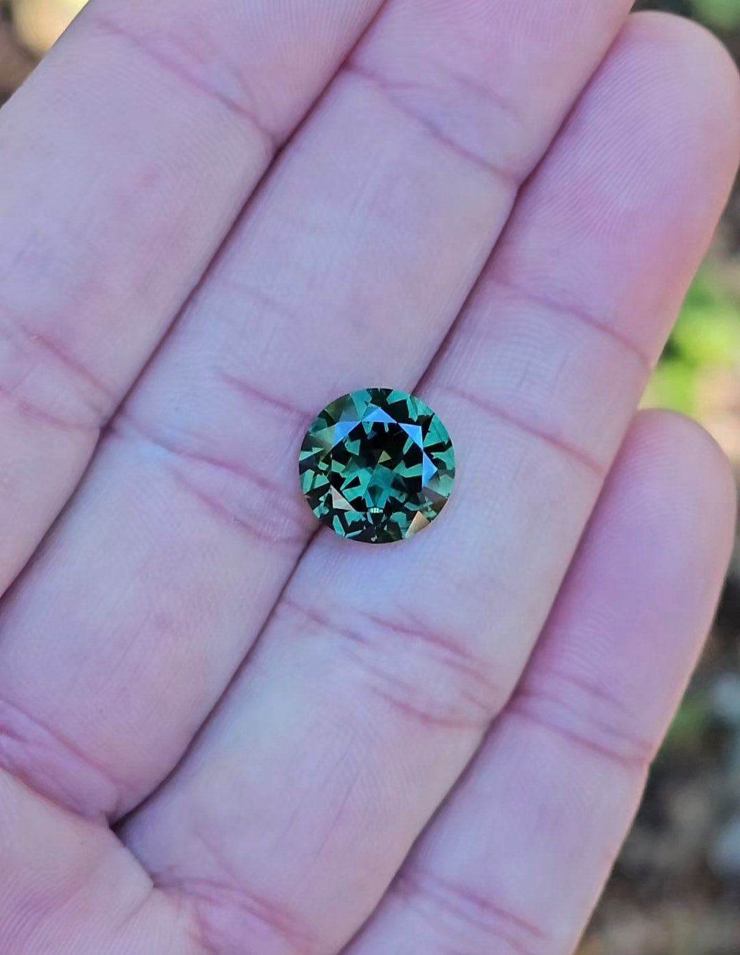 4.73ct Round Green Parti Sapphire