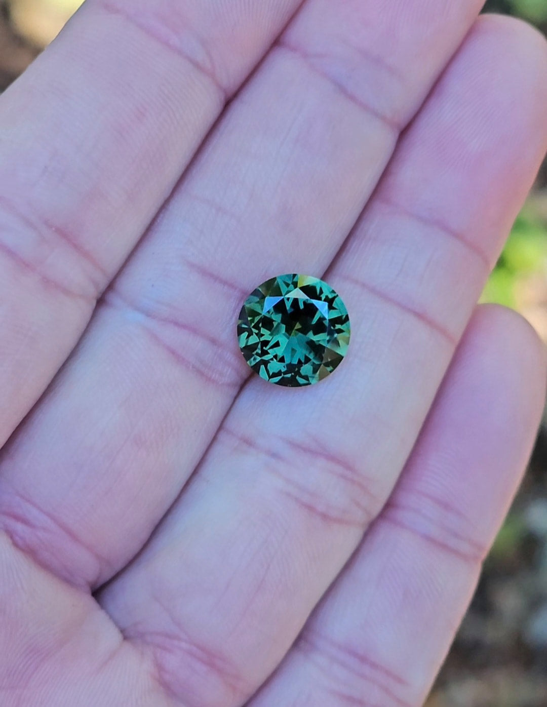 4.73ct Round Green Parti Sapphire