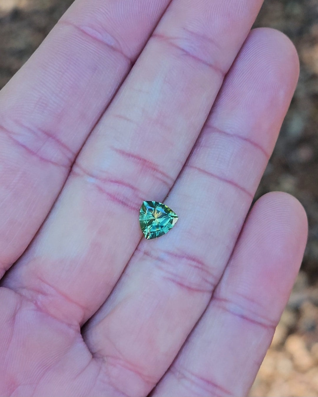 1.25ct Trilliant Green Parti Sapphire