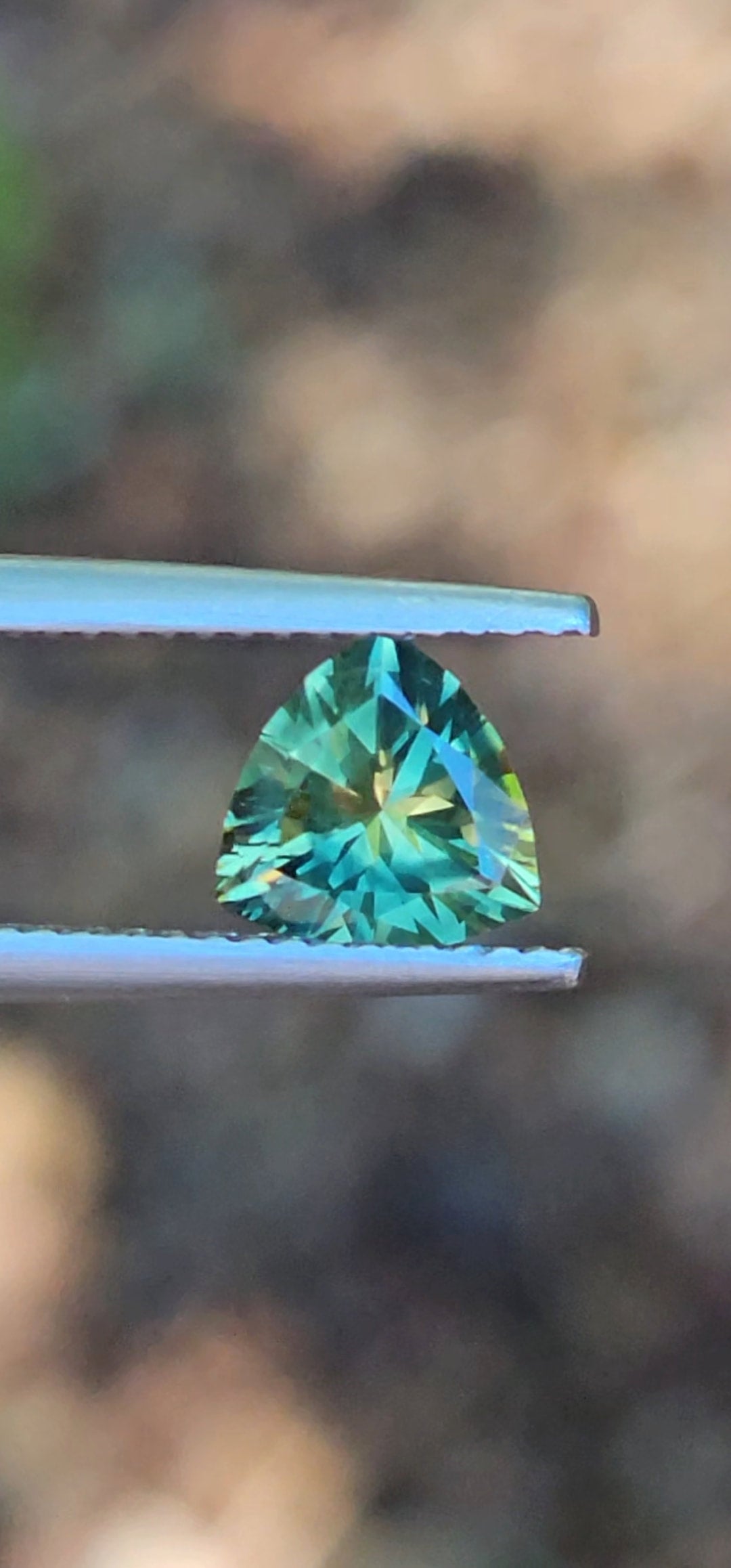 1.25ct Trilliant Green Parti Sapphire
