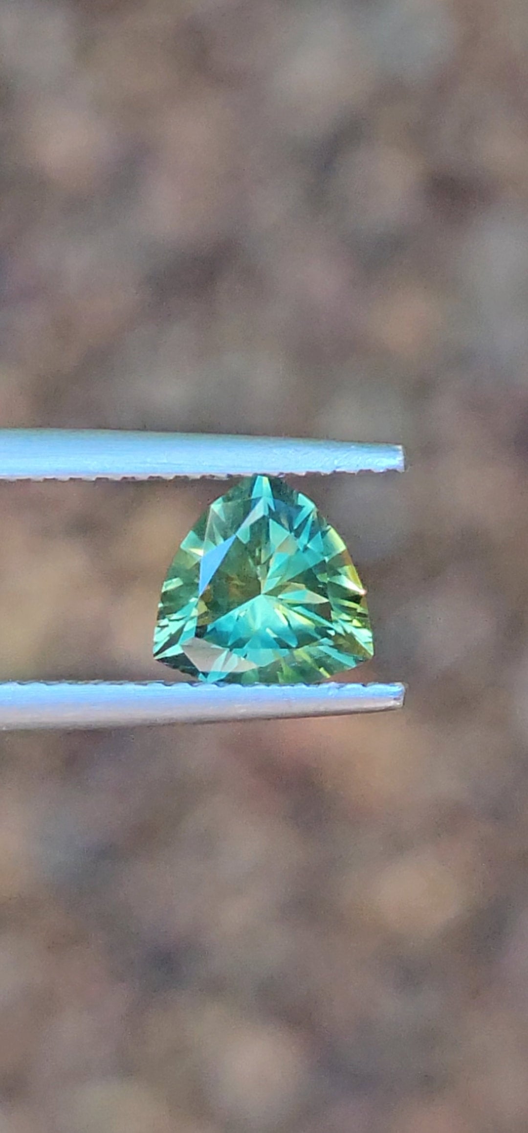 1.25ct Trilliant Green Parti Sapphire