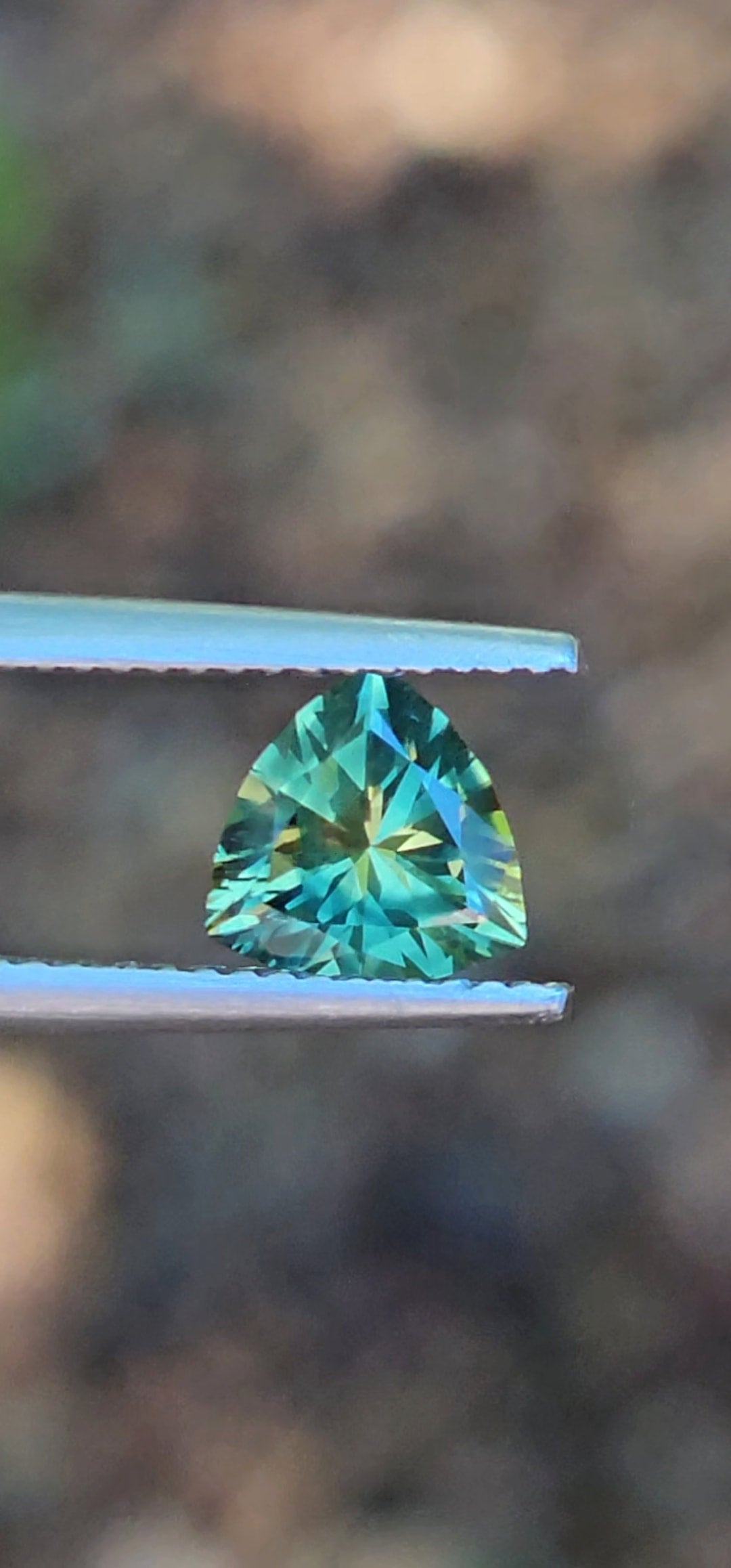 1.25ct Trilliant Green Parti Sapphire