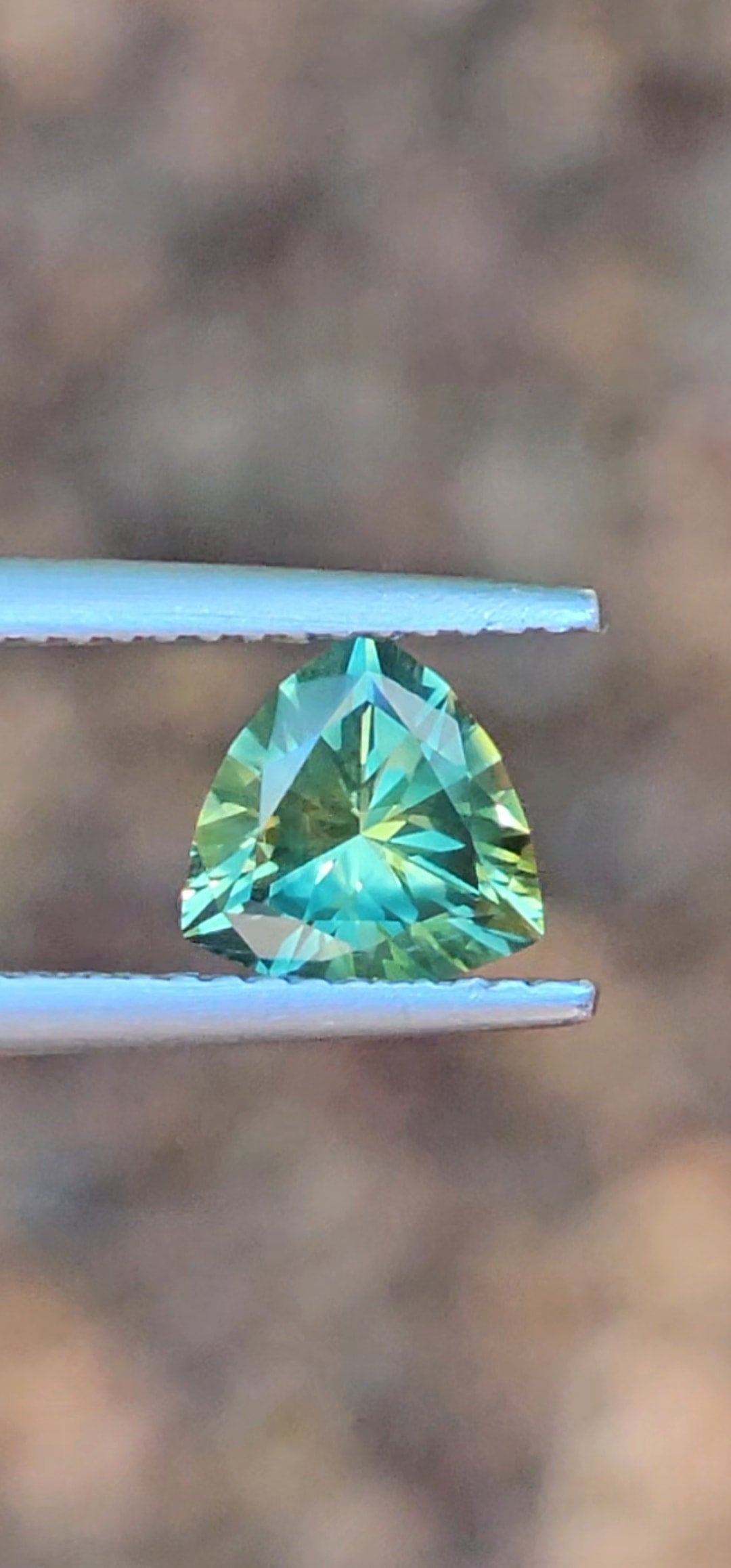 1.25ct Trilliant Green Parti Sapphire
