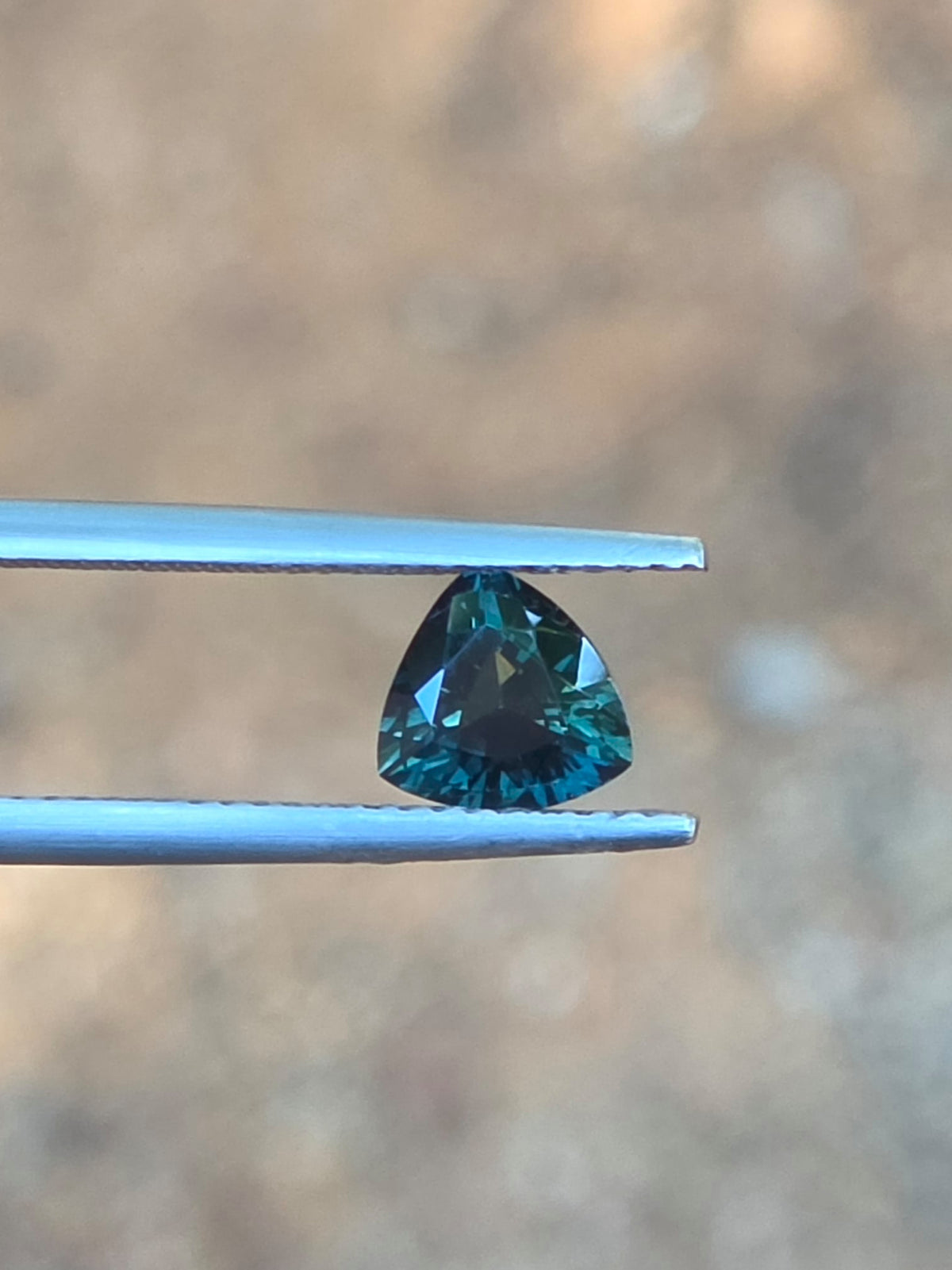 1.07ct Trilliant Green Sapphire
