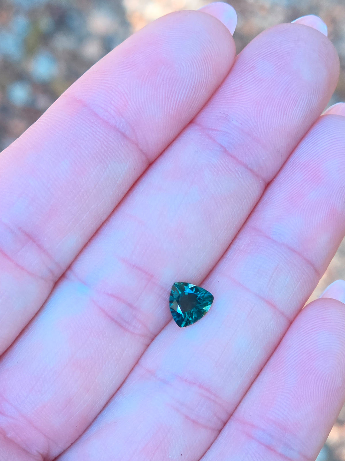 1.07ct Trilliant Green Sapphire