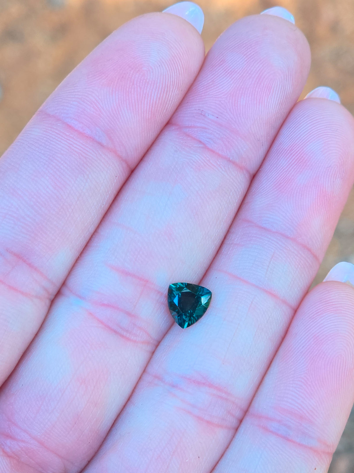 1.07ct Trilliant Green Sapphire