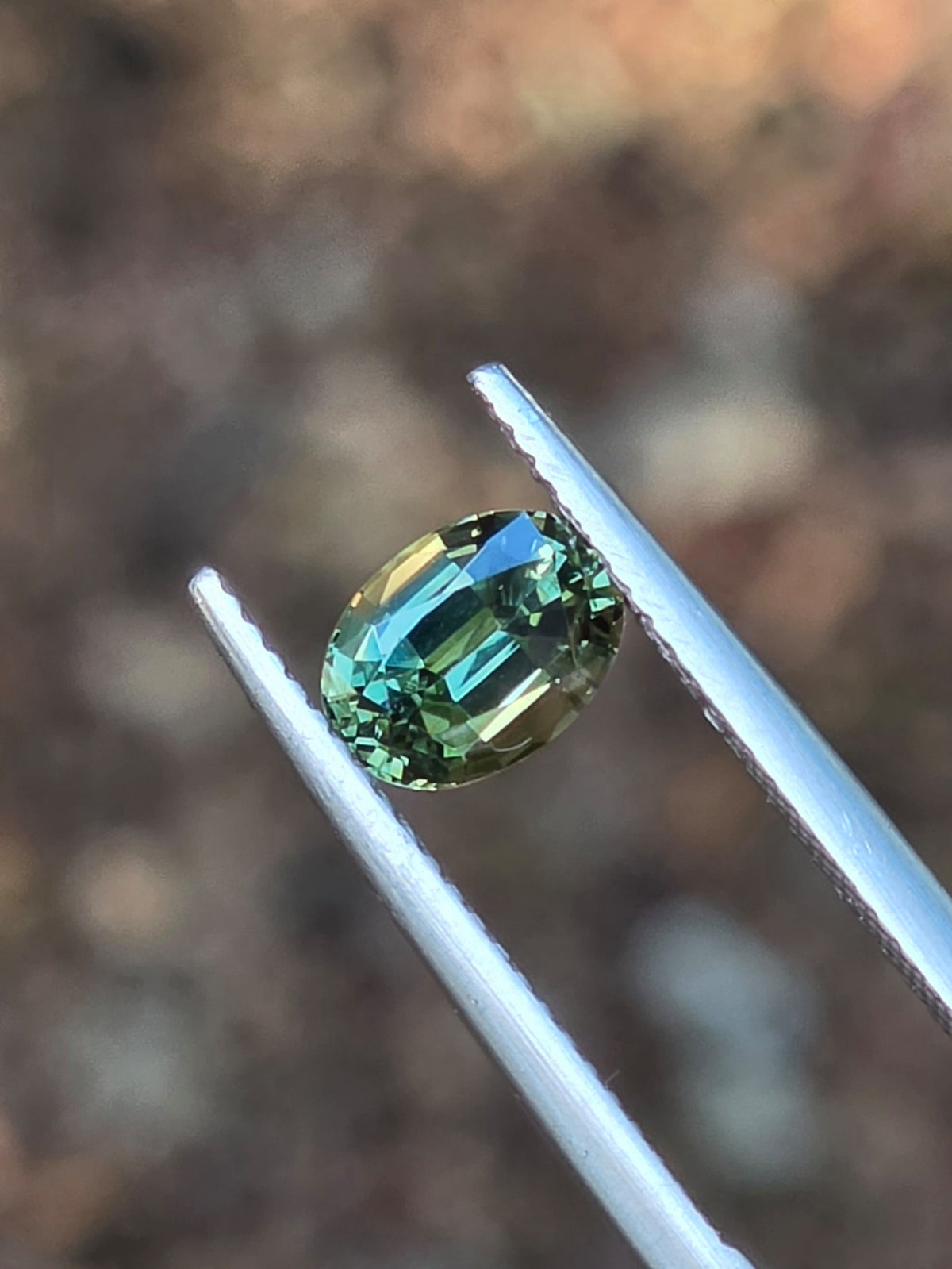 1.35ct Oval Green Parti Sapphire