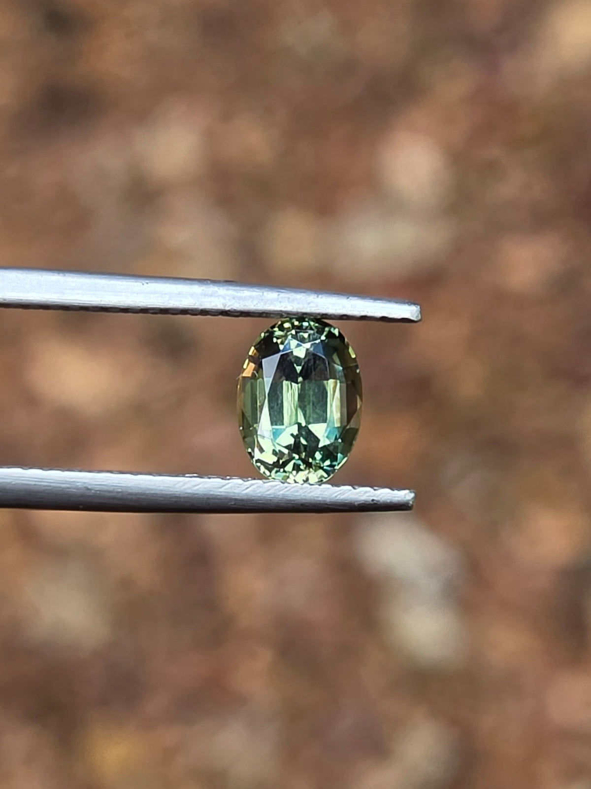 1.35ct Oval Green Parti Sapphire