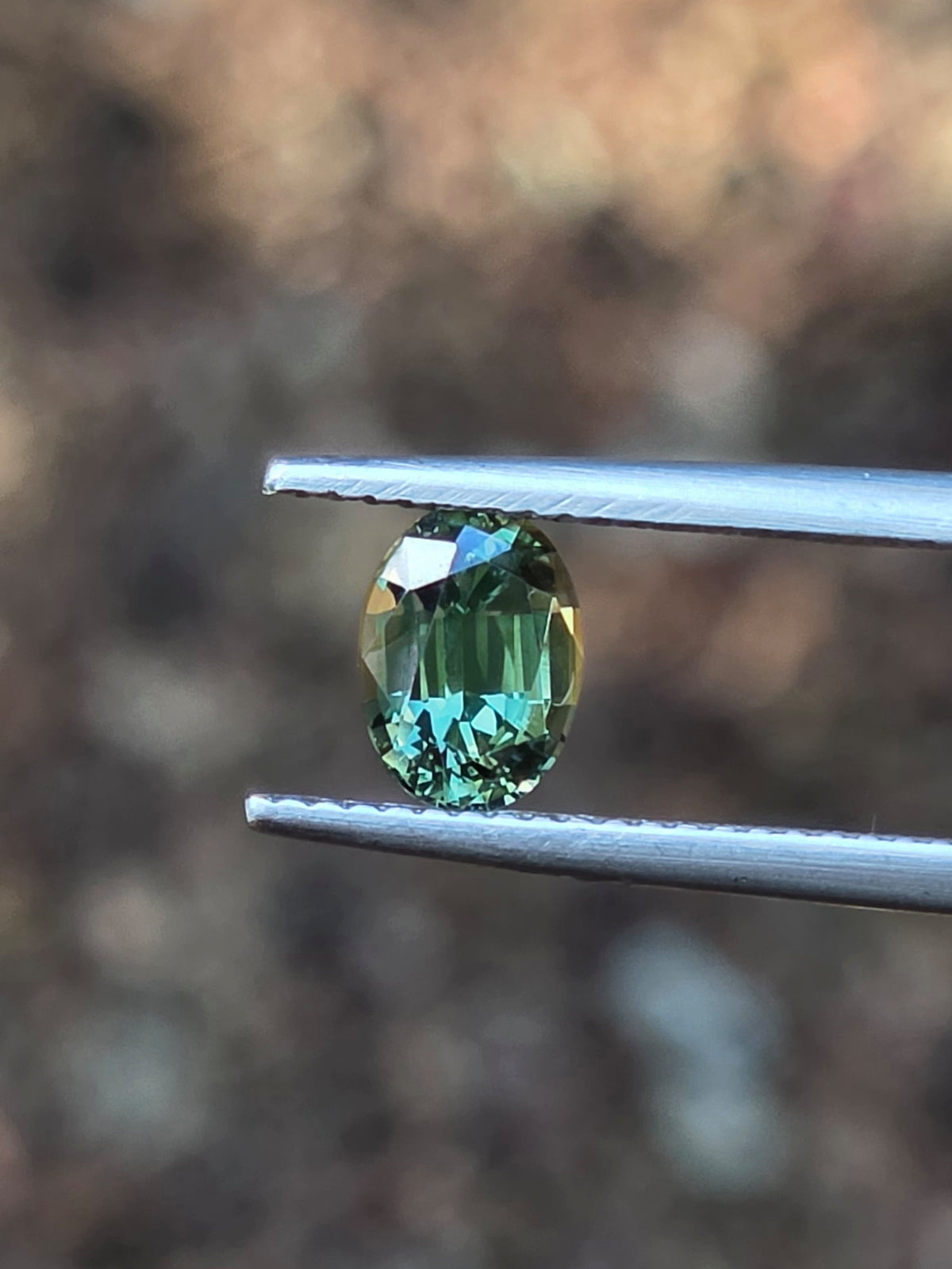 1.35ct Oval Green Parti Sapphire