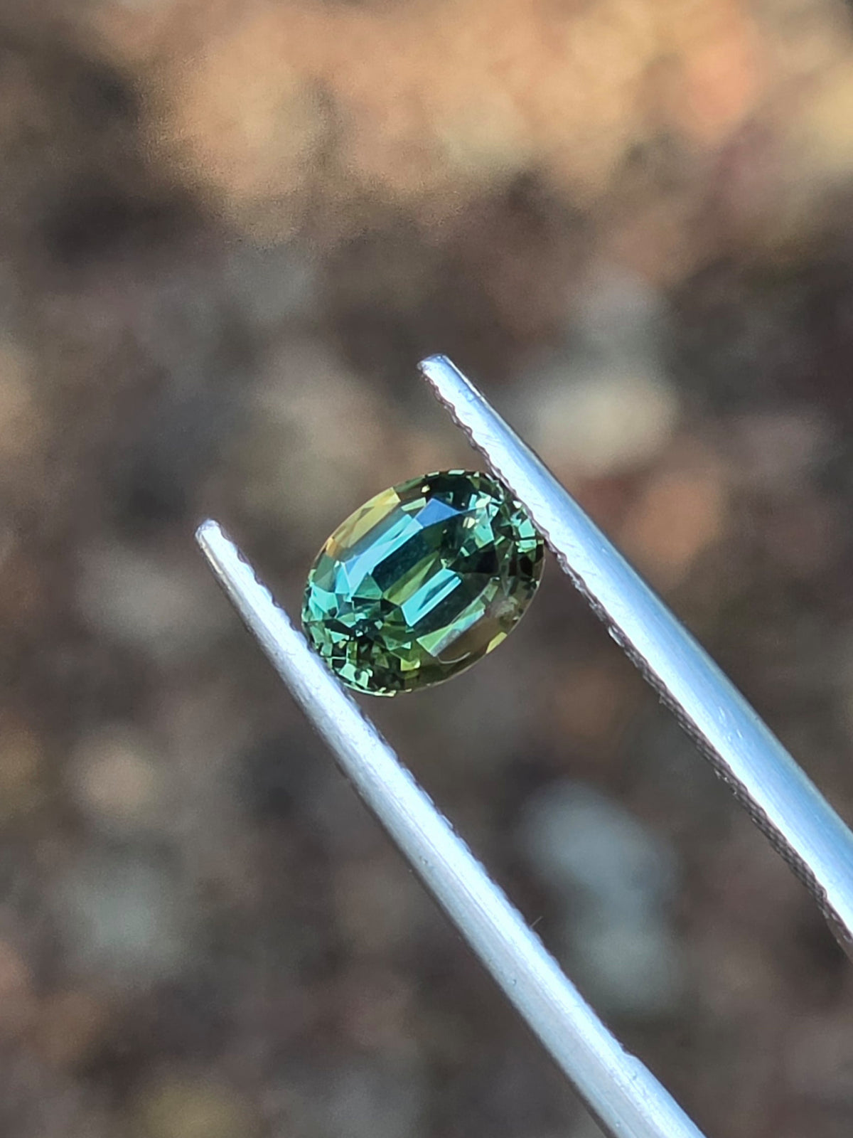 1.35ct Oval Green Parti Sapphire