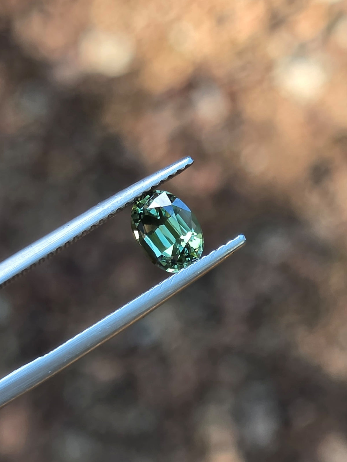 1.35ct Oval Green Parti Sapphire