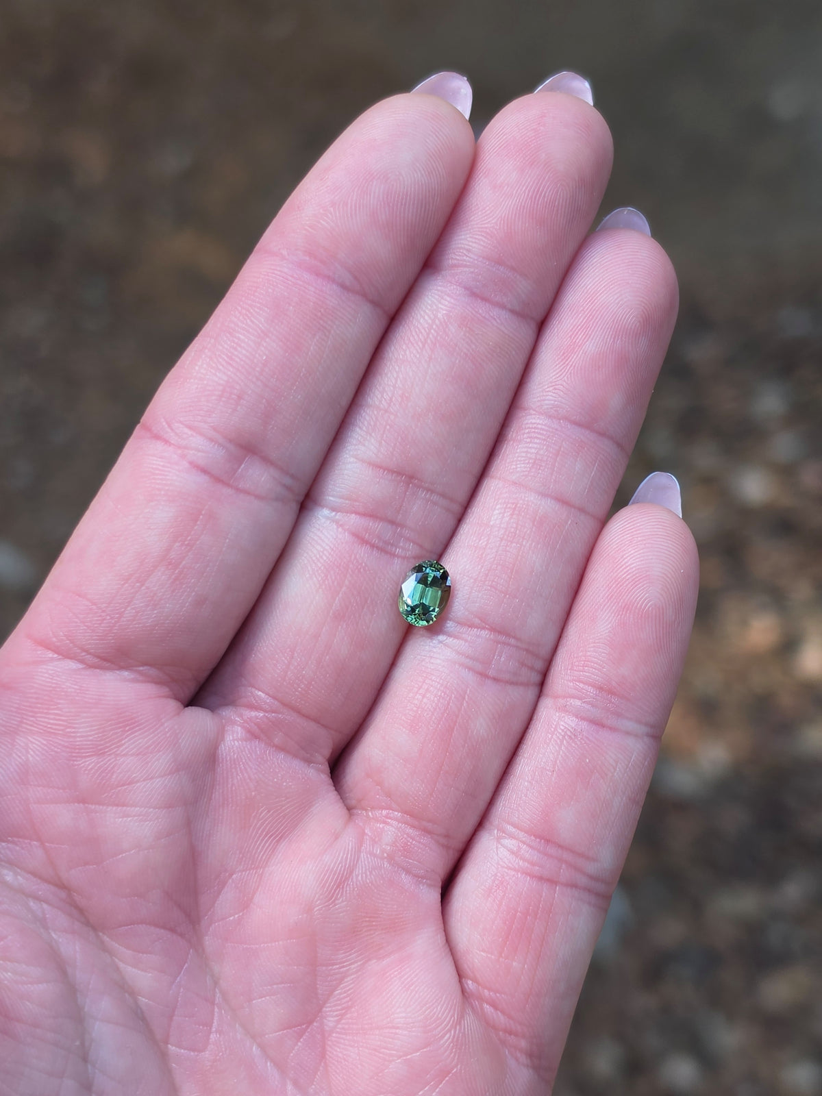 1.35ct Oval Green Parti Sapphire