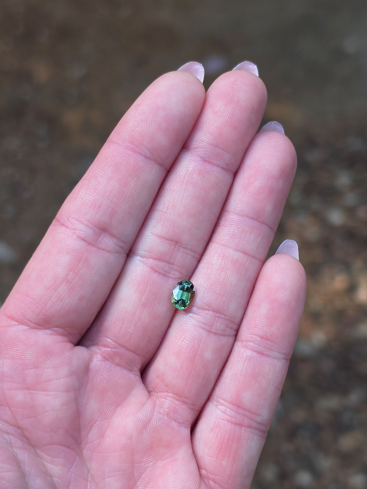 1.35ct Oval Green Parti Sapphire