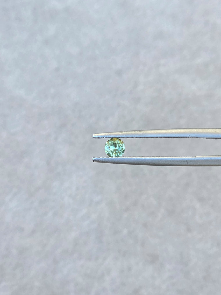.25ct Round Green Parti Sapphire