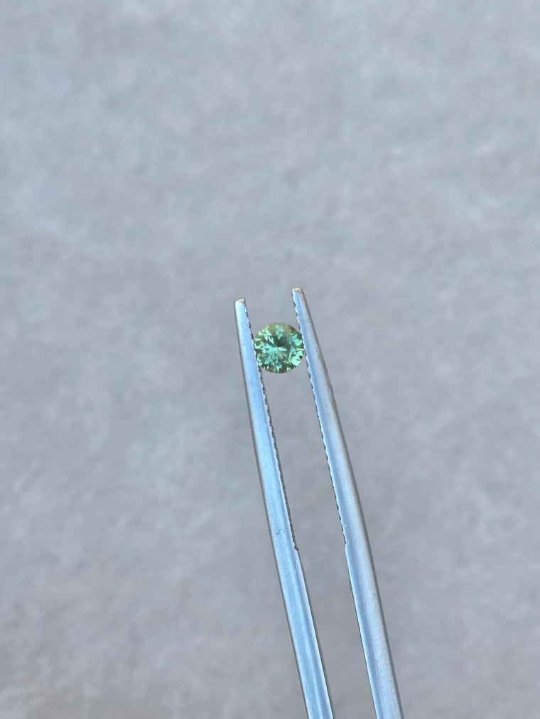 .25ct Round Green Parti Sapphire