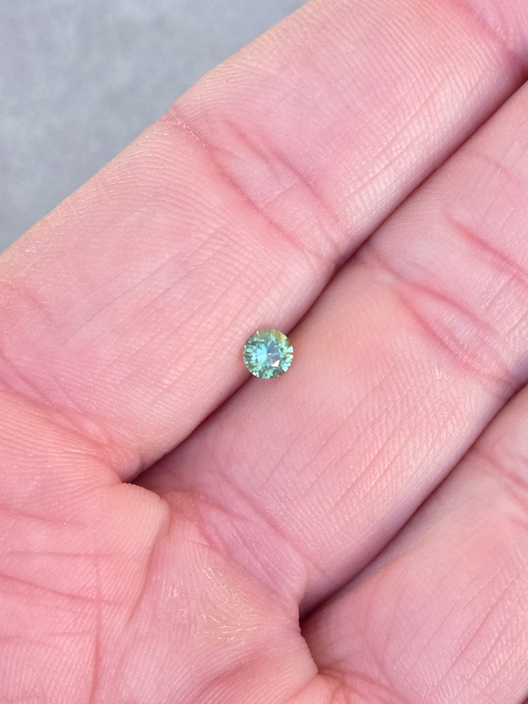 .25ct Round Green Parti Sapphire