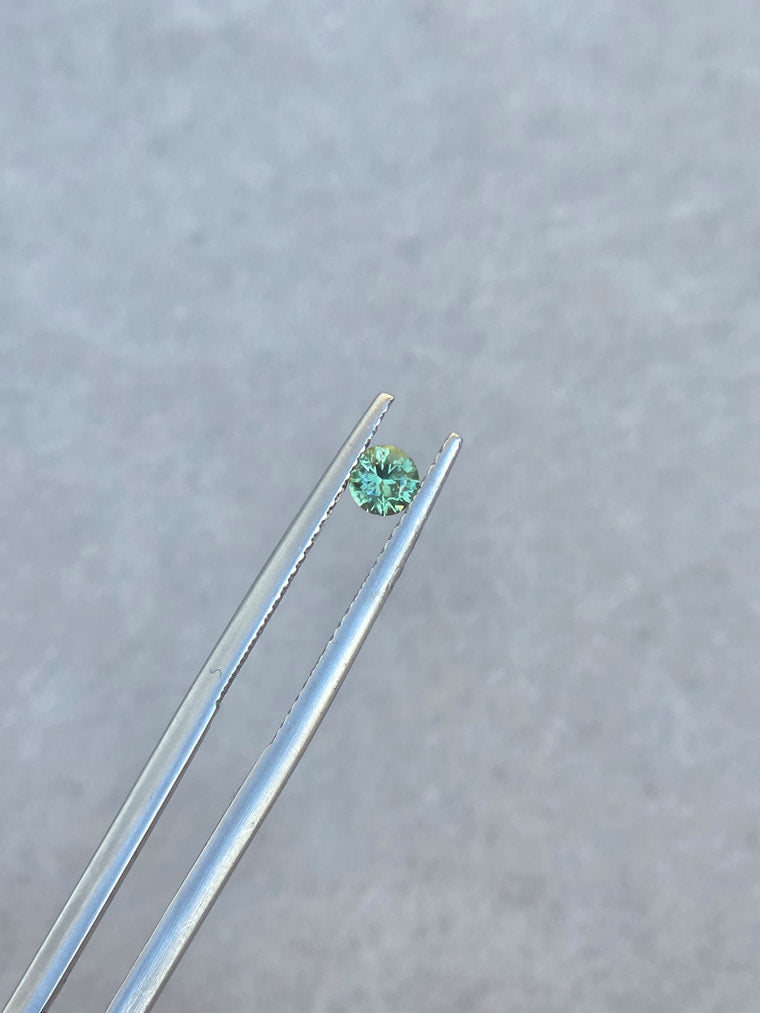 .25ct Round Green Parti Sapphire