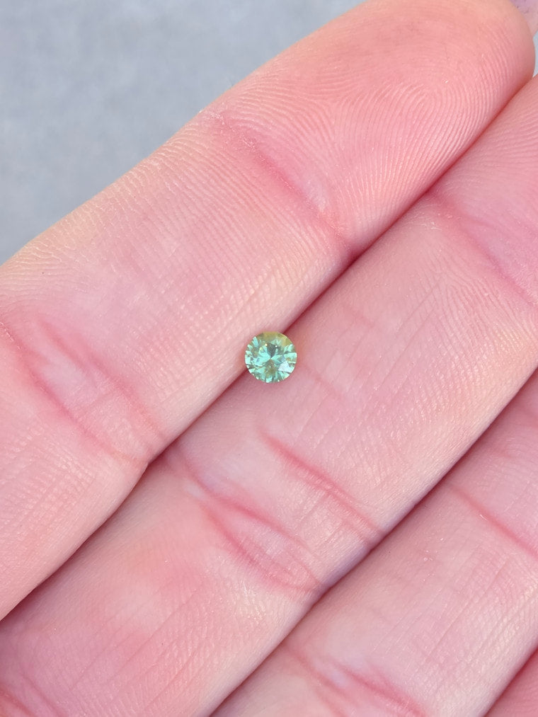 .25ct Round Green Parti Sapphire