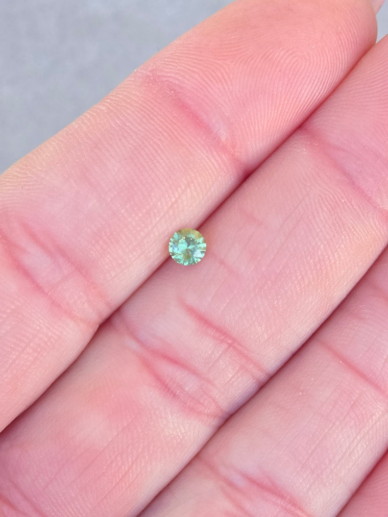.25ct Round Green Parti Sapphire