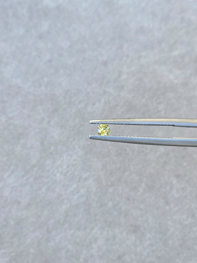 .13ct Round Yellow Sapphire