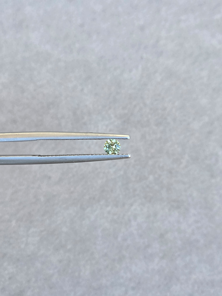 .18ct Round Green Parti Sapphire