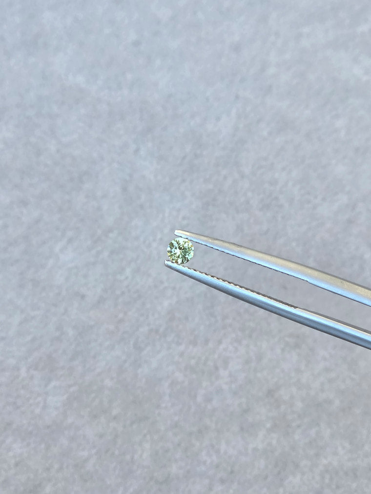 .18ct Round Green Parti Sapphire