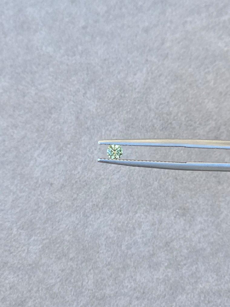 .18ct Round Green Parti Sapphire