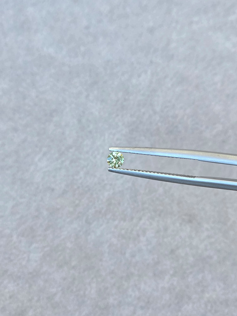 .18ct Round Green Parti Sapphire