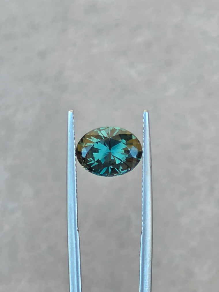 3.72ct Oval Teal Parti Sapphire