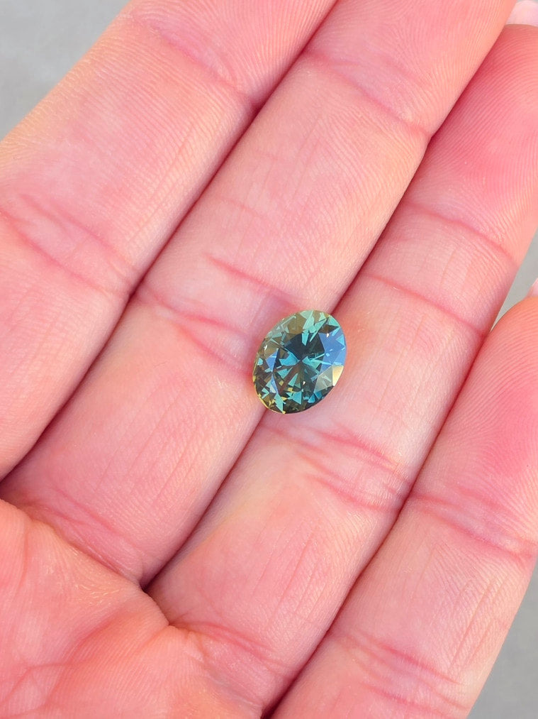 3.72ct Oval Teal Parti Sapphire