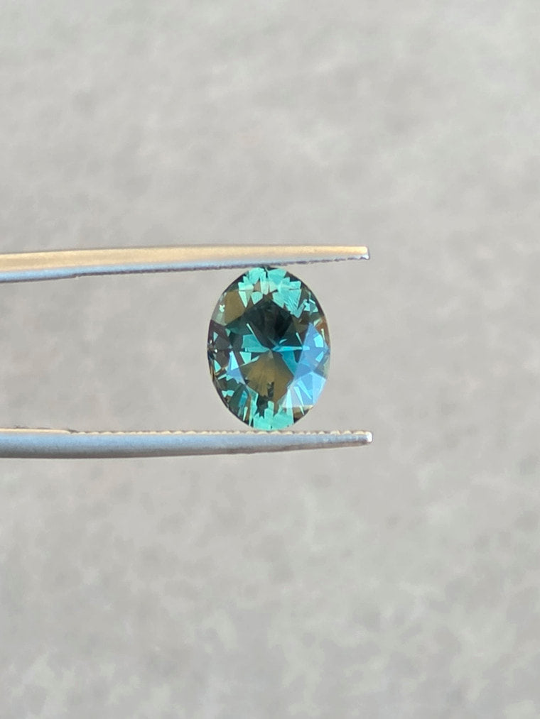 3.72ct Oval Teal Parti Sapphire