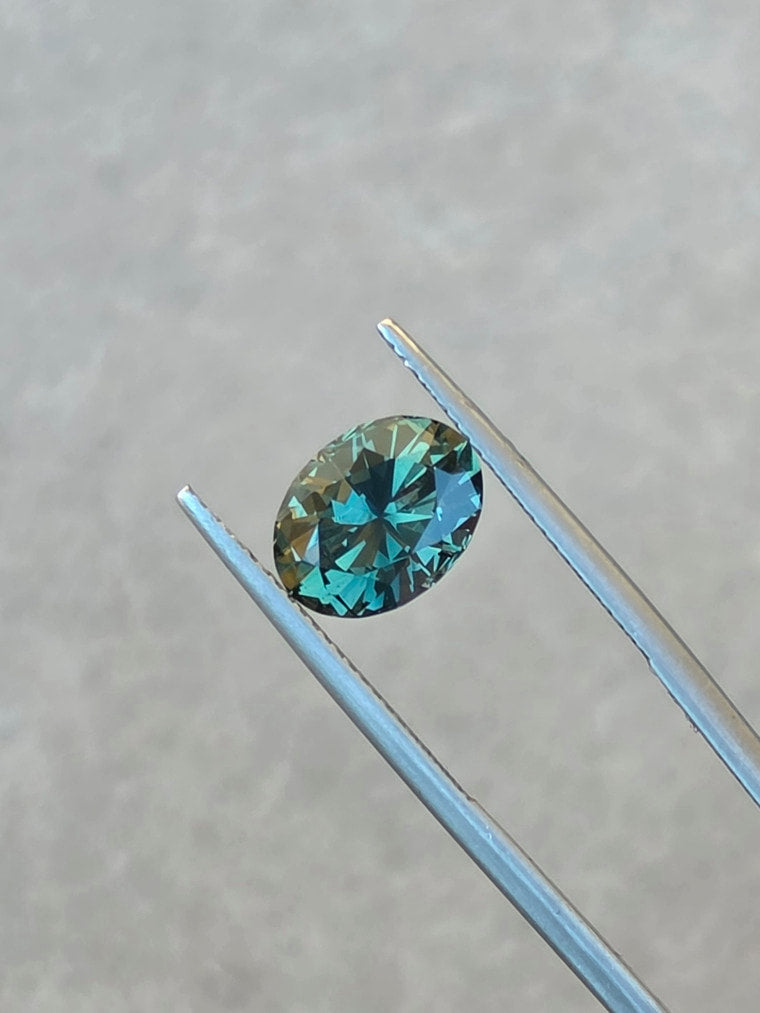 3.72ct Oval Teal Parti Sapphire