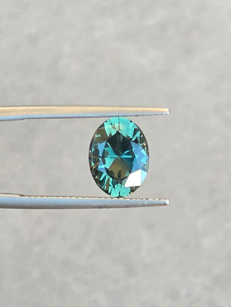 3.72ct Oval Teal Parti Sapphire