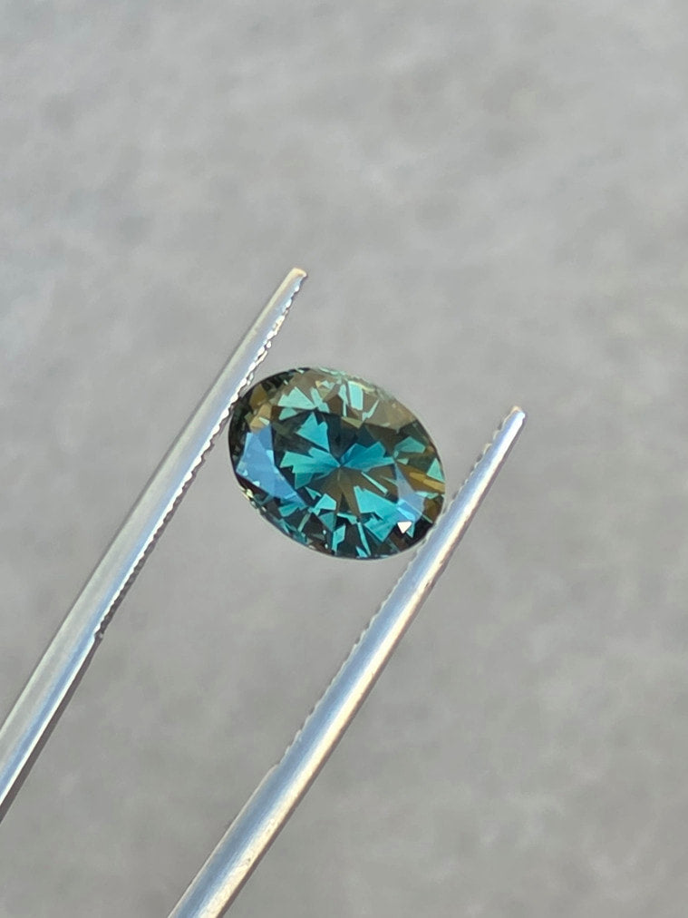 3.72ct Oval Teal Parti Sapphire