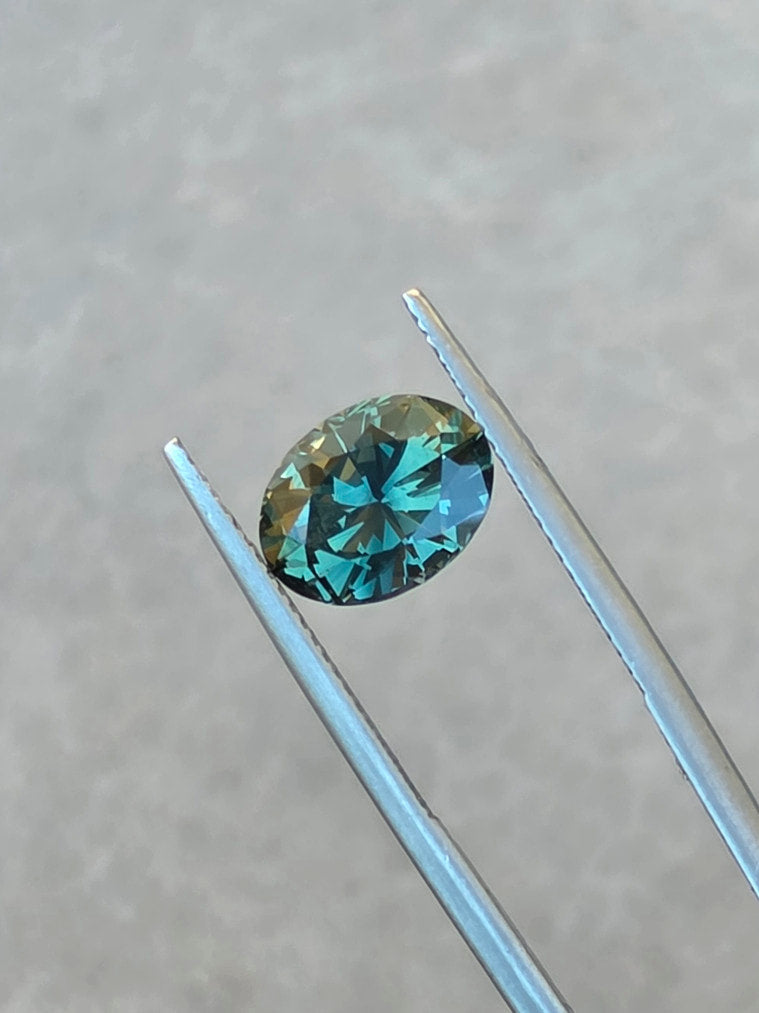 3.72ct Oval Teal Parti Sapphire