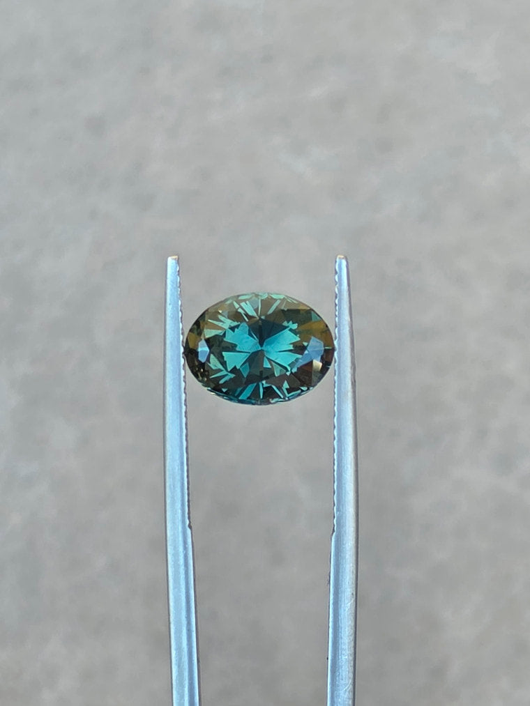 3.72ct Oval Teal Parti Sapphire