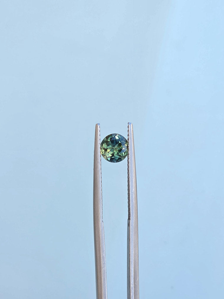 1.09ct Round Green Parti Sapphire